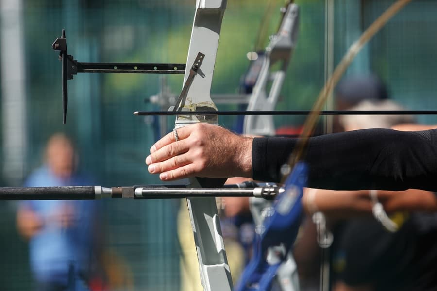 Archers shooting longbows